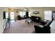 Bright and airy living room featuring neutral tones and large windows at 303 Fortress Dr, Morrisville, NC 27560