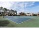 Well-maintained community tennis courts surrounded by lush greenery at 303 Fortress Dr, Morrisville, NC 27560