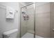 Shower enclosure features glass doors, tiled walls, and modern fixtures at 305 Wash Hollow Dr, Wendell, NC 27591
