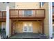 A backyard patio beneath a deck. Includes access to the house via glass doors at 317 Michigan Ave, Cary, NC 27519