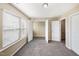 Comfortable bedroom offering an open closet, neutral walls, and plush carpeting, ready for personalization at 317 Michigan Ave, Cary, NC 27519