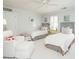 Bright bedroom with two beds, white furniture, and patterned headboards, creating a cozy and inviting space at 3321 Marblehead Ln, Raleigh, NC 27612