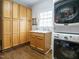 Functional laundry room equipped with modern washer, dryer, and ample cabinet space at 3321 Marblehead Ln, Raleigh, NC 27612