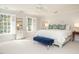 Serene main bedroom with white walls, soft carpet, and sun-filled windows at 3321 Marblehead Ln, Raleigh, NC 27612
