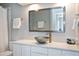 Elegant bathroom featuring a vessel sink, quartz countertop, and modern fixtures at 3424 Forest Oaks Dr, Chapel Hill, NC 27514