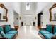 Elegant foyer featuring tile floors, high ceilings, and classic decor at 3424 Forest Oaks Dr, Chapel Hill, NC 27514