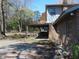 Spacious backyard of brick home featuring a covered patio, ideal for outdoor entertaining at 3601 Colonial Ln, Rocky Mount, NC 27804