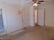 Spacious bedroom showcasing three doors and neutral carpeting at 3601 Colonial Ln, Rocky Mount, NC 27804