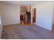Carpeted living room showcasing staircase and open floor plan at 3601 Colonial Ln, Rocky Mount, NC 27804