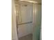 Close up view of a glass enclosed shower featuring white tile and safety bars at 3601 Colonial Ln, Rocky Mount, NC 27804