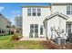 View of a patio with chairs in the backyard of a home at 3615 Ramblewood Ave, Durham, NC 27713