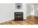 Cozy fireplace with black surround and decorative mantel in living area at 3615 Ramblewood Ave, Durham, NC 27713