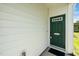 Welcoming front door with decorative window and stylish address plate at 3615 Ramblewood Ave, Durham, NC 27713
