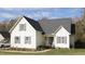 Charming two-story home with a well-maintained front yard and a classic design at 392 Travel Lite Dr, Raleigh, NC 27603