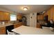 Traditional kitchen featuring wood cabinets and a functional layout at 392 Travel Lite Dr, Raleigh, NC 27603