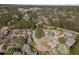 Aerial view of the neighborhood with houses, trees, and winding roads at 4 Applewood Sq, Durham, NC 27713