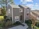 Two-story home featuring a private entrance and landscaping at 4 Applewood Sq, Durham, NC 27713