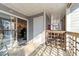 Covered deck with sliding glass door entry to the home's interior, featuring outdoor space at 4631 Timbermill Ct # 301, Raleigh, NC 27612