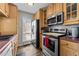 Modern kitchen featuring stainless steel appliances at 4631 Timbermill Ct # 301, Raleigh, NC 27612