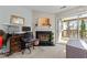 Living room with built in fireplace and access to outdoor deck at 4631 Timbermill Ct # 301, Raleigh, NC 27612