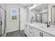 Bathroom featuring double vanity and walk-in shower at 4706 Cypress Tree Ln, Raleigh, NC 27612