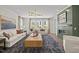 Spacious living room features a cozy fireplace and ample seating in an open layout at 4706 Cypress Tree Ln, Raleigh, NC 27612