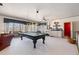 Entertainment room with pool table, kitchenette, and plenty of space for relaxation and recreation at 4808 Clubview Ct, Fuquay Varina, NC 27526
