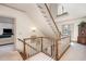 Hallway featuring wooden stairs and a neutral color palette at 4808 Clubview Ct, Fuquay Varina, NC 27526