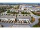 Aerial view of a townhome community showcasing the layout and surrounding area at 4963 Highcroft Dr, Cary, NC 27519