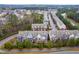 Community view showing well-maintained townhomes and neighborhood streets at 4963 Highcroft Dr, Cary, NC 27519