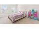 Bright bedroom with carpet and large window creating a cozy and comfortable retreat at 4963 Highcroft Dr, Cary, NC 27519