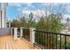 Back deck overlooking lush greenery, providing privacy and a serene outdoor space at 4963 Highcroft Dr, Cary, NC 27519