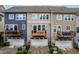 Charming townhome exteriors featuring individual balconies above garages at 4963 Highcroft Dr, Cary, NC 27519