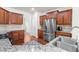 Modern kitchen boasts granite countertops, stainless steel appliances, and ample cabinet storage at 4963 Highcroft Dr, Cary, NC 27519