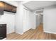 Spacious hallway with a closet, light colored walls, and wood colored flooring at 514 Peele St # A, Burlington, NC 27215