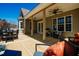 Inviting back porch with a dining area and seating area, perfect for outdoor relaxation and entertaining in a serene setting at 6720 Colleen Rd, Rocky Mount, NC 27803