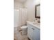 Clean bathroom showcases a vanity with sink, toilet, and shower with curtain at 6720 Colleen Rd, Rocky Mount, NC 27803