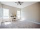 Bedroom featuring neutral carpet, ceiling fan and abundant natural light at 6720 Colleen Rd, Rocky Mount, NC 27803