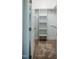 Walk-in closet with carpeted floor, and built in shelving at 6720 Colleen Rd, Rocky Mount, NC 27803