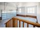 Spacious three-car garage featuring brick accents, white walls, and ample natural light, ready for vehicles and storage at 6720 Colleen Rd, Rocky Mount, NC 27803