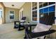 Inviting porch with Adirondack chairs, neutral colors, and plenty of space for relaxation and outdoor enjoyment at 6720 Colleen Rd, Rocky Mount, NC 27803