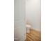 Simple and functional powder room featuring wood-look flooring and a clean, minimalist design at 6720 Colleen Rd, Rocky Mount, NC 27803