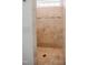 Tiled stand up shower with a glass mosaic accent stripe at 6720 Colleen Rd, Rocky Mount, NC 27803