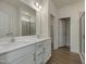Bathroom with double vanity, modern fixtures, and walk-in shower at 789 Old Station Pointe, Angier, NC 27501