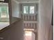 View of the open foyer showcasing its staircase, and natural light streaming in at 789 Old Station Pointe, Angier, NC 27501