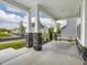 Spacious front porch with stone-based columns provides great views of the neighborhood at 789 Old Station Pointe, Angier, NC 27501