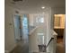 Hallway overlooks stairs and features access to bedrooms and bathrooms at 789 Old Station Pointe, Angier, NC 27501