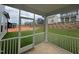 Covered patio provides relaxing outdoor space with views of the backyard and the surrounding neighborhood at 789 Old Station Pointe, Angier, NC 27501