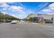 Street view of the main road running through Angier, NC featuring retail businesses and public artwork at 789 Old Station Pointe, Angier, NC 27501