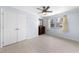 Inviting bedroom featuring a large window, closet and dresser at 916 Clayton Rd, Durham, NC 27703